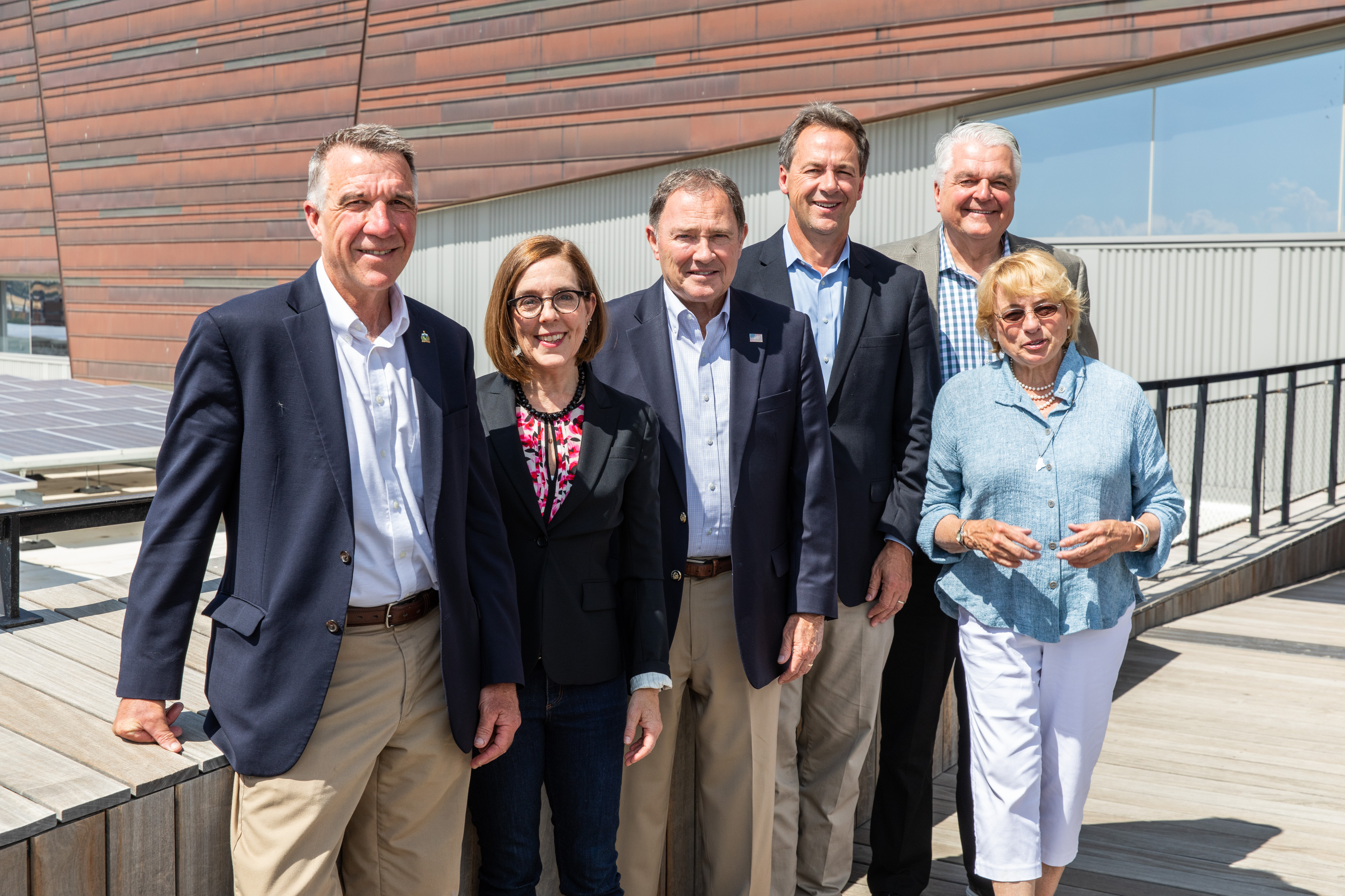 Vermont Governor Phil Scott, Oregon Governor Kate Brown, Utah Governor Gary Herbert, Montana Governor Steve Bullock, Nevada Governor Steve Sisolak and Maine Governor Janet Mills after launching the Outdoor Recreation Learning Network at the Utah Natural History Museum.