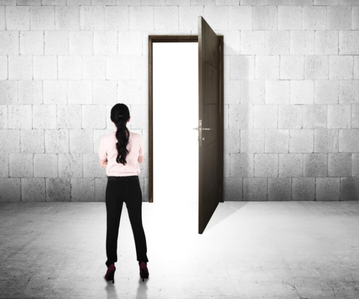 Business woman going to the open door. Career path conceptual