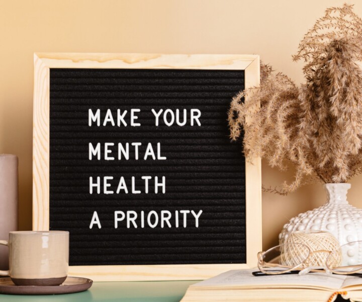 Make your mental health a priority motivational quote on the letter board. Inspiration psycological text