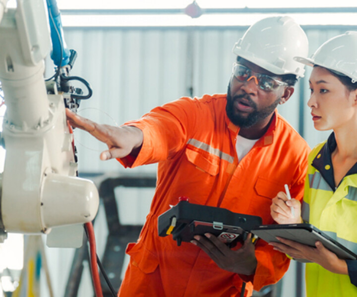 Diversity Professional Engineer training and discussing in Robot Development Plant, smart factory and Industry Engineering Intelligence Innovation Technology concept