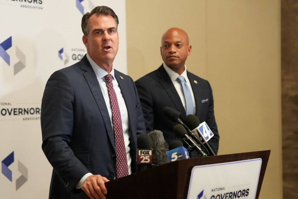 Oklahoma Gov. Kevin Stitt and Maryland Gov. Wes Moore address media at the 2026 NGA Summer Meeting